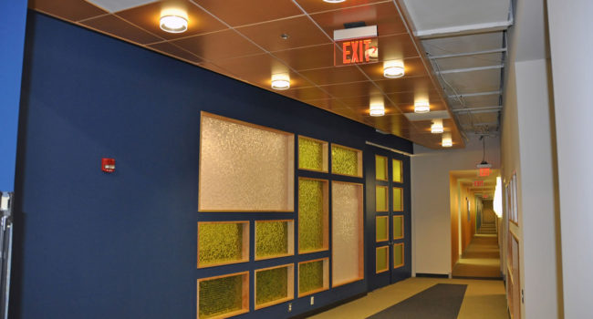 3000 sf high-end renovation of an occupied office space, including custom millwork and 3-Form custom glass walls